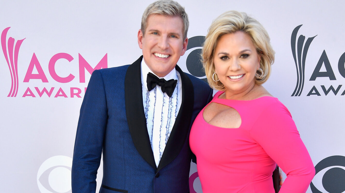 TV personalities Todd Chrisley (L) and Julie Chrisley attend the 52nd Academy Of Country Music Awards