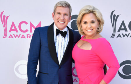 TV personalities Todd Chrisley (L) and Julie Chrisley attend the 52nd Academy Of Country Music Awards