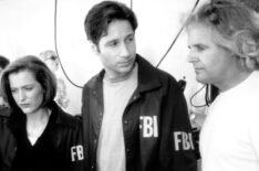 Gillian Anderson, David Duchovny, and Chris Carter on the set of the film 'The X-Files'