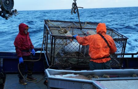 Titan Explorer crew preparing pot to set