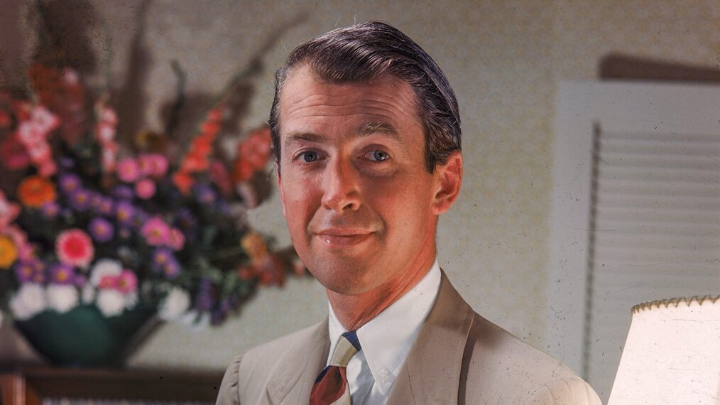 Jimmy Stewart (1908 -1997) seated wearing a tan suit, 1940s.
