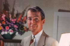 Jimmy Stewart (1908 -1997) seated wearing a tan suit, 1940s.