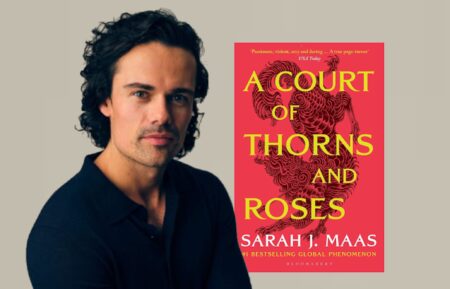 jamie roy with 'a court of thorns and roses' book cover