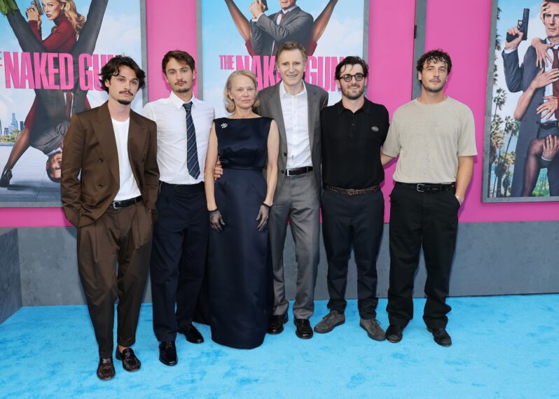 Dylan Jagger Lee, Brandon Thomas Lee, Pamela Anderson, Liam Neeson, Daniel Neeson, and Micheál Neeson attend "The Naked Gun" New York Premiere on July 28, 2025 in New York City.