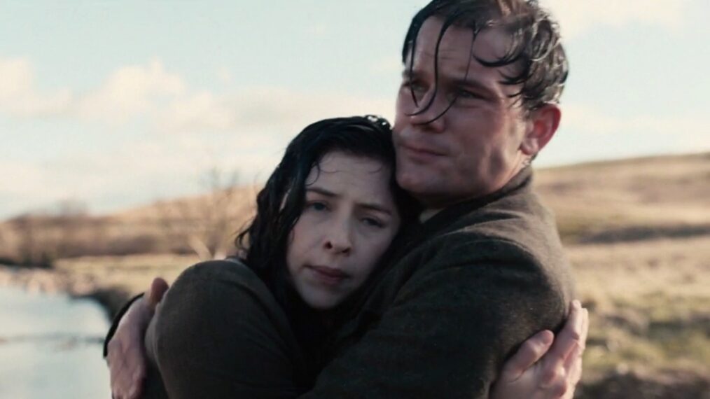 Hermione Corfield and Jeremy Irvine in 'Outlander: Blood of My Blood' Season 1