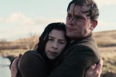 Hermione Corfield and Jeremy Irvine in 'Outlander: Blood of My Blood' Season 1