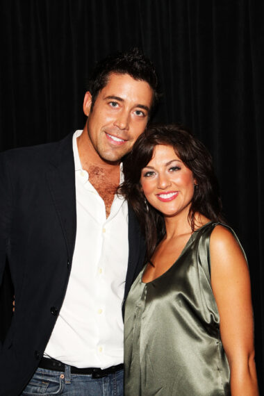 personalities Ed Swiderski (L) and Jillian Harris pose at Venexiana Spring 2010 Fashion Show