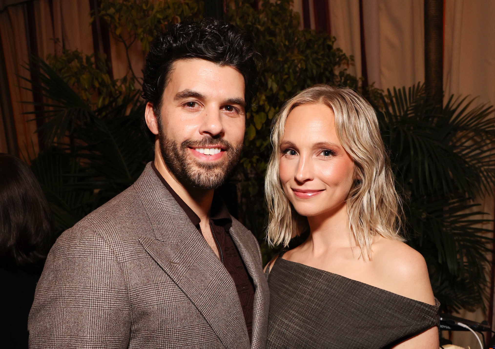 Steven Krueger and Candice King attend the 