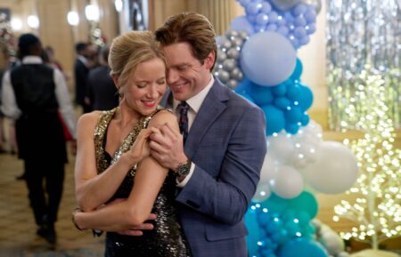 Jessy Schram and Dominic Sherwood in 'A Suite Holiday Romance'
