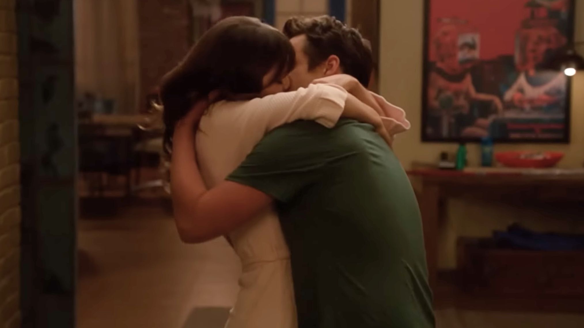 Zooey Deschanel and Jake Johnson kiss in 'New Girl'