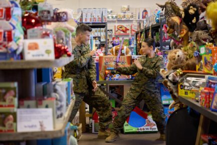Parker Young and Janel Parrish in 'Christmas on Duty'