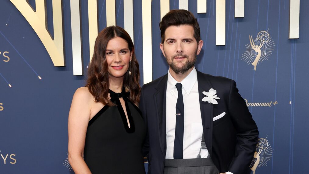 Naomi Scott and Adam Scott attend the 77th Primetime Emmy Awards at Peacock Theater on September 14, 2025 in Los Angeles, California.