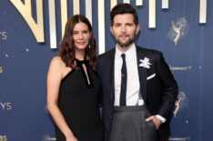 Naomi Scott and Adam Scott attend the 77th Primetime Emmy Awards at Peacock Theater on September 14, 2025 in Los Angeles, California.