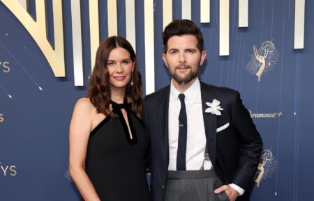 Naomi Scott and Adam Scott attend the 77th Primetime Emmy Awards at Peacock Theater on September 14, 2025 in Los Angeles, California.