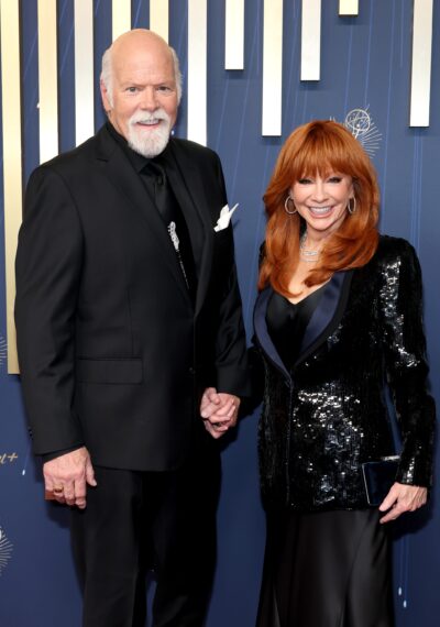 Rex Linn and Reba McEntire attend the 77th Primetime Emmy Awards at Peacock Theater on September 14, 2025 in Los Angeles, California.