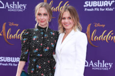 Natasha Bure (L) and Candace Cameron-Bure attend the premiere of Disney's 'Aladdin'