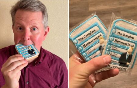 Ken Jennings eating cookies that resemble the cover of his book, 