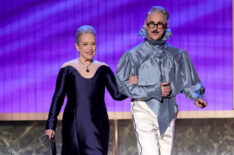 Kathy Bates and Alan Cumming speak onstage during the 77th Primetime Emmy Awards