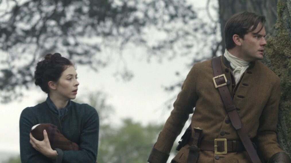 Hermione Corfield and Jeremy Irvine in 'Outlander: Blood of My Bood' Season 1
