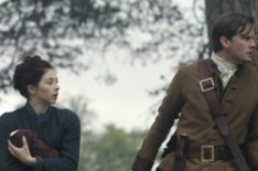 Hermione Corfield and Jeremy Irvine in 'Outlander: Blood of My Bood' Season 1
