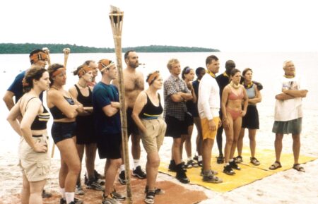 SURVIVOR, (aka SURVIVOR: BORNEO), contestants: Susan Hawk (3rd from left), Rudy Boesch (5th from left - red shirt), Sean Kenniff (6th from left - blue shirt), Richard Hatch (7th from left - shirtless), Sonja Christopher (8th from left - khaki shorts), Greg Buis (8th from right - checkered shirt), Colleen Haskell (7th from right), Ramona Gray (6th from right - obscured), Gervase Peterson (4th from right), Gretchen Cordy (2nd from right), B.B. Andersen (right), (Season 1, premiered May 31, 2000)