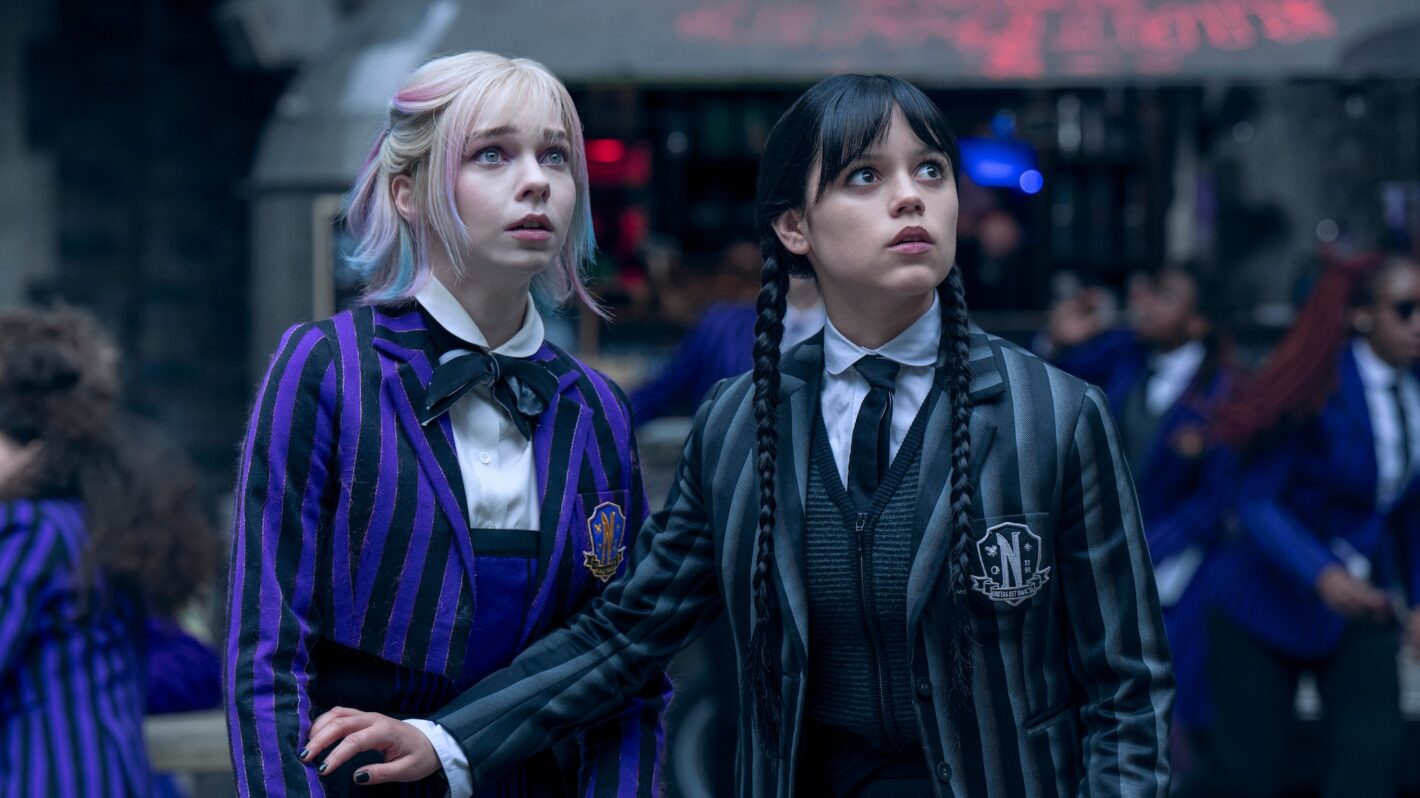 Wednesday. (L to R) Emma Myers as Enid, Jenna Ortega as Wednesday Addams in episode 204 of Wednesday. Cr. Helen Sloan/Netflix © 2025