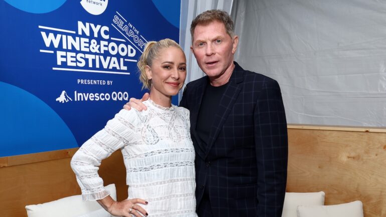 Brooke Williamson and Bobby Flay attend the Grand Tasting: After Dark presented by Montchevre Goat Cheese hosted by Bobby Flay and Brooke Williamson during Food Network New York City Wine & Food Festival presented by Invesco QQQ on October 18, 2025 in New York City.