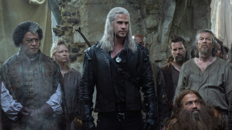 Laurence Fishburne and Liam Hemsworth in Netflix's The Witcher