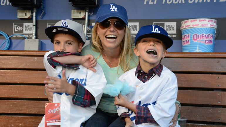 In this handout photo provided by the LA Dodgers, Britney Spears poses with sons Sean Preston Federline (L) and Jayden James Federline (R) during agame against the San Diego Padres at Dodger Stadium