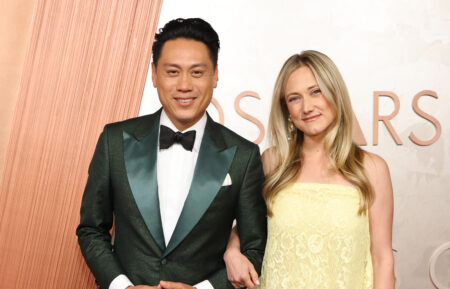 Jon M. Chu and Kristin Hodge attend the 97th Annual Oscars at Dolby Theatre on March 02, 2025 in Hollywood, California