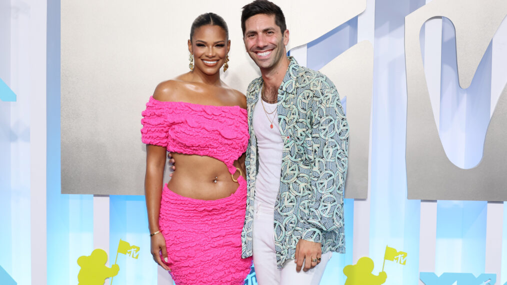 Kamie Crawford and Nev Schulman attend the 2022 MTV VMAs at Prudential Center