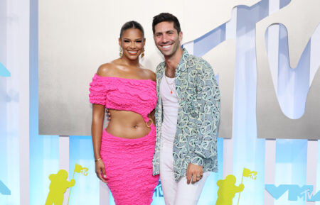 Kamie Crawford and Nev Schulman attend the 2022 MTV VMAs at Prudential Center