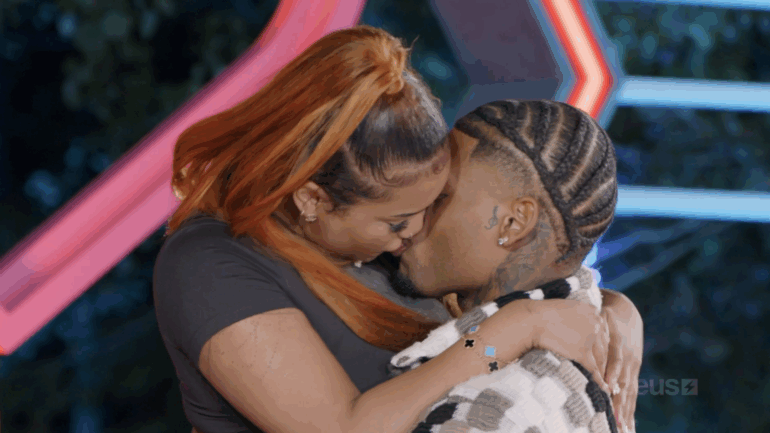 A couple kisses in 'Love Cabin'