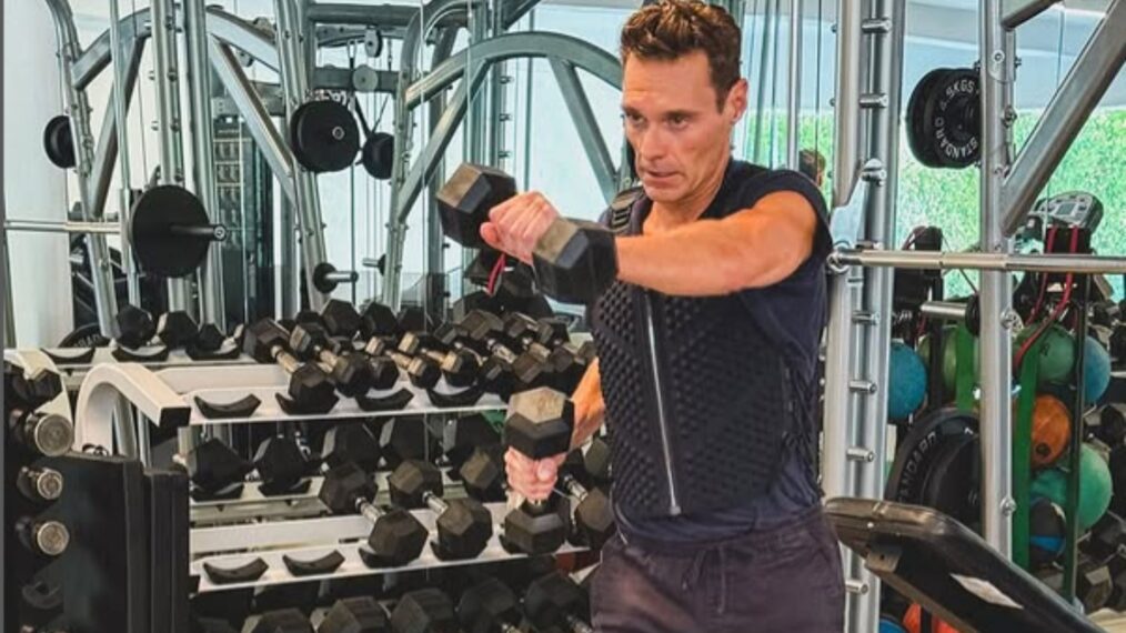 Ryan Seacrest working out with his dog, Georgia