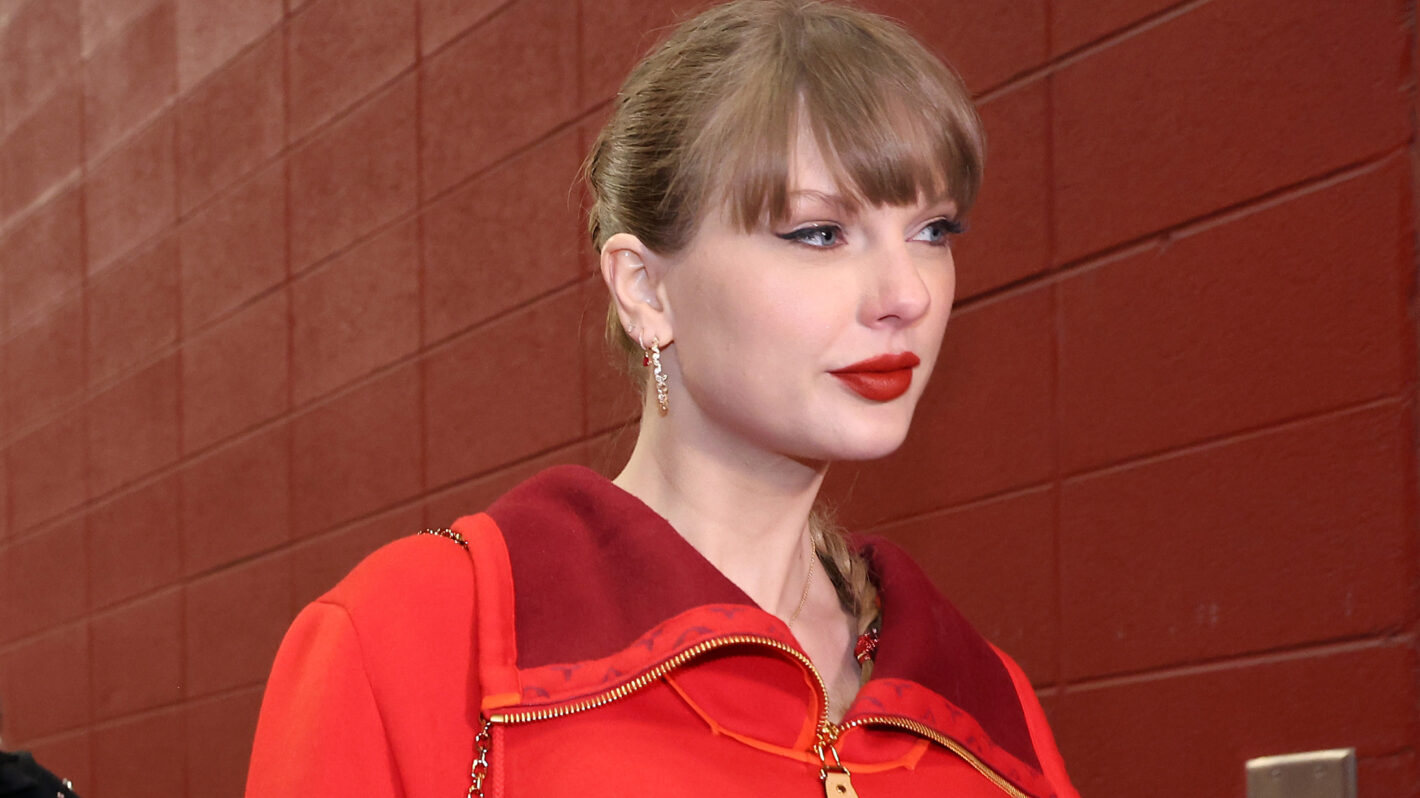 Singer Taylor Swift walks into the stadium prior to the game between the Las Vegas Raiders and the Kansas City Chiefs at GEHA Field at Arrowhead Stadium on November 29, 2024