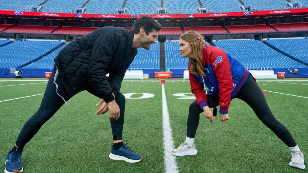 Matthew Daddario and Holland Roden star as Gabe DeLuca and Morgan Quinn in Holiday Touchdown: A Bills Love Story on Hallmark