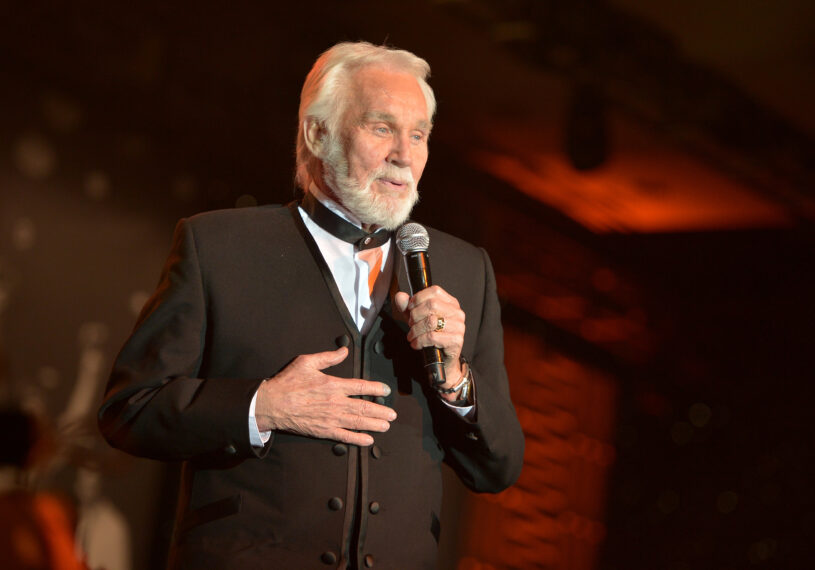 PHOENIX, AZ - APRIL 12: Singer Kenny Rogers performs onstage during Muhammad Ali's Celebrity Fight Night XX held at the JW Marriott Desert Ridge Resort & Spa on April 12, 2014 in Phoenix, Arizona. (Photo by Charley Gallay/Getty Images for Celebrity Fight Night)