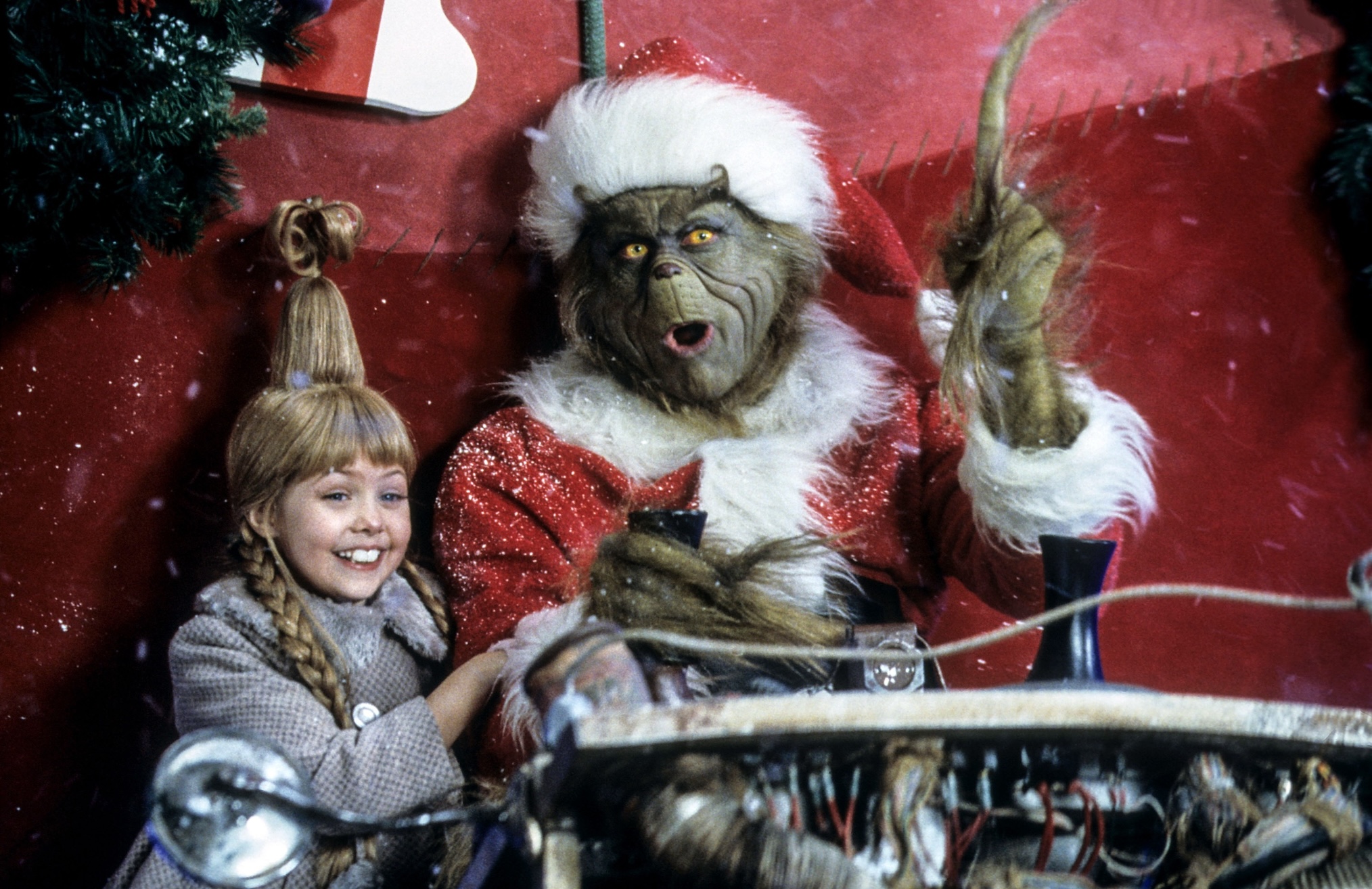Jim Carrey as the Grinch and Taylor Momsen in 'How the Grinch Stole Christmas'