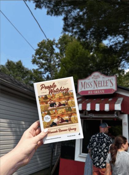 Hannah Bonam-Young poses with her book 'People Watching'