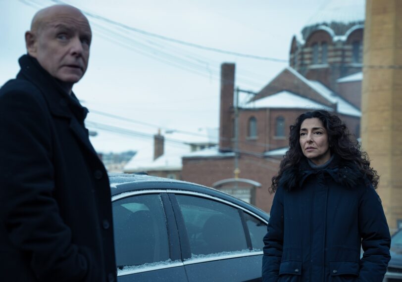 L-R: Hugh Dillon as Ian and Necar Zadegan as Evelyn in Mayor of Kingstown season 4, streaming on Paramount+, 2025. Credit: Dennis P. Mong Jr./Paramount+ ©2025 Viacom International Inc. All Rights Reserved. Mayor of Kingstown and all related titles, logos and characters are trademarks of Viacom International Inc.