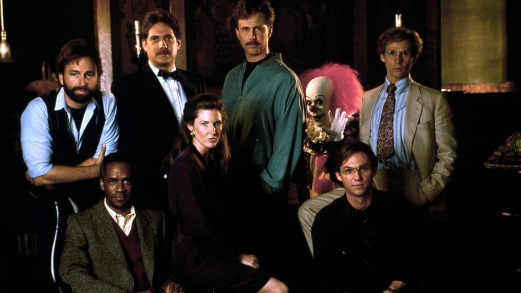 IT, (aka STEPHEN KING'S IT), clockwise from top left: John Ritter, Richard Masur, Harry Anderson, Tim Curry as Pennywise, Dennis Christopher, Richard Thomas, Annette O'Toole, Tim Reid, 1990