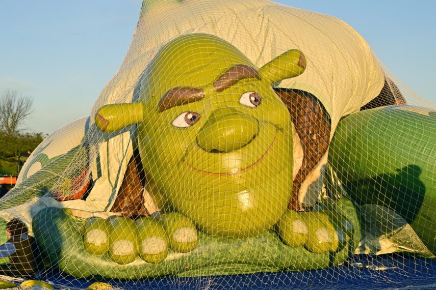 EAST RUTHERFORD, NEW JERSEY - NOVEMBER 01: Shrek’s Onion Carriage from Universal Pictures’ Dreamworks Animation is being prepared during the 99th Macy's Thanksgiving Day Parade Balloonfest at MetLife Stadium on November 01, 2025 in East Rutherford, New Jersey. (Photo by Eugene Gologursky/Getty Images for Macy's)