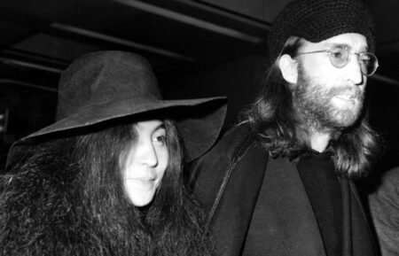 John Lennon, with Yoko Ono at London's Heathrow Airport ca. 1969