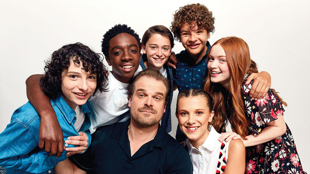 Stranger Than Fiction SAN DIEGO, CA - JULY 22: (Back row L-R) Actors Finn Wolfhard, Caleb McLaughlin, Noah Schnapp, Gaten Matarazzo, Sadie Sink, (front row L-R) David Harbour and Millie Bobby Brown from Netflix's 'Stranger Things' pose for a portrait during Comic-Con 2017 at Hard Rock Hotel San Diego on July 22, 2017