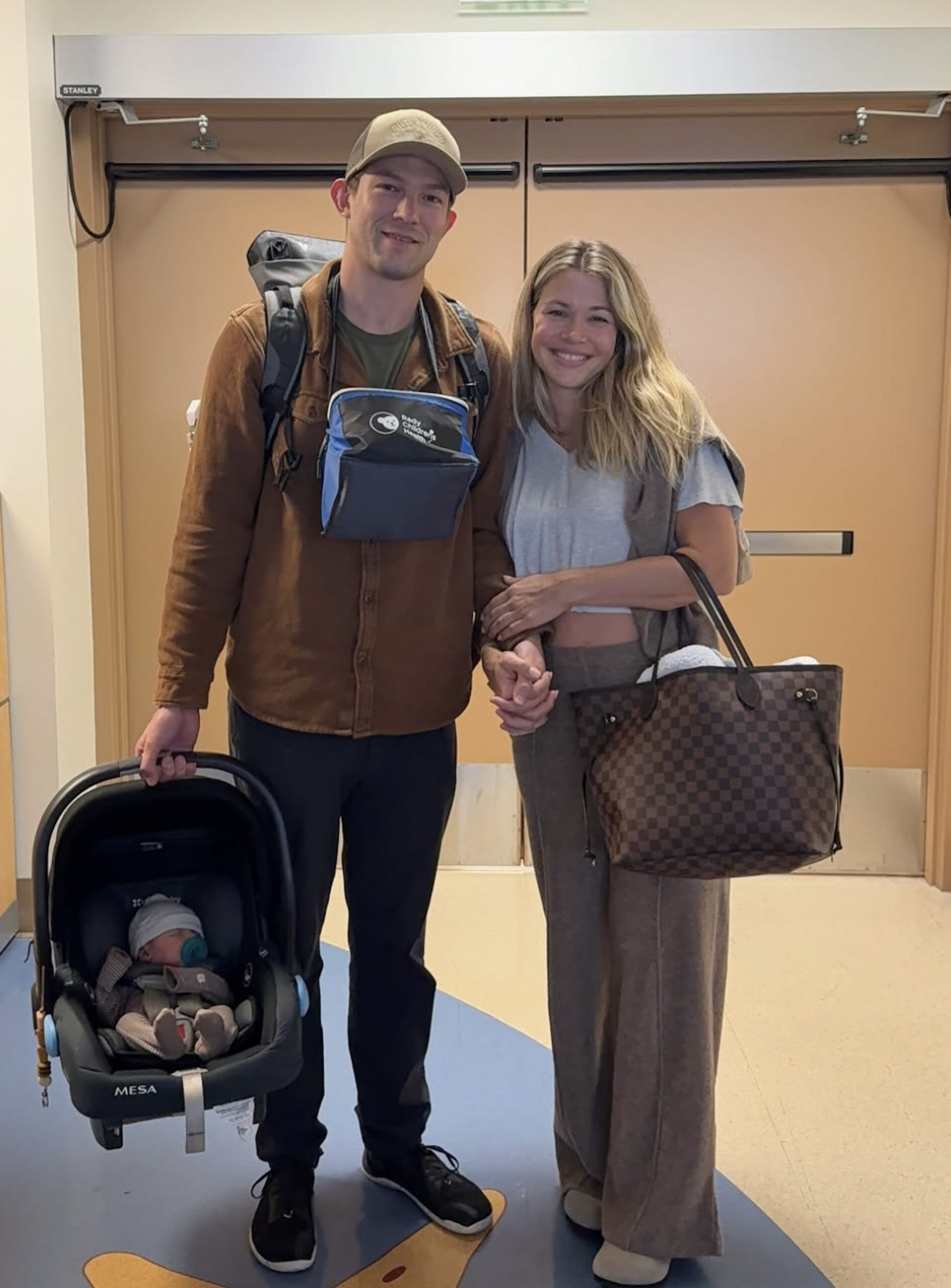 Krystal Nielson with Miles Bowles after the birth of their child