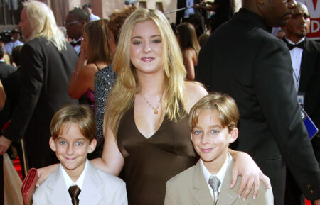 Madylin Sweeten (back) and brothers Sawyer Sweeten and Sullivan Sweeten arrive at the 57th Annual Emmy Awards held at the Shrine Auditorium on September 18, 2005 in Los Angeles, California