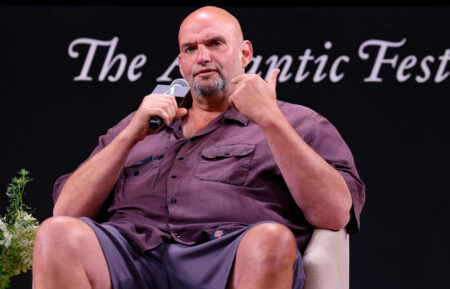 John Fetterman speaks on stage during the 