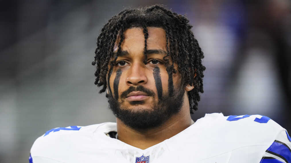 Marshawn Kneeland #94 of the Dallas Cowboys looks on from the sideline during the national anthem prior to an NFL football game against the Tampa Bay Buccaneers at AT&T Stadium on December 22, 2024 in Arlington, Texas.