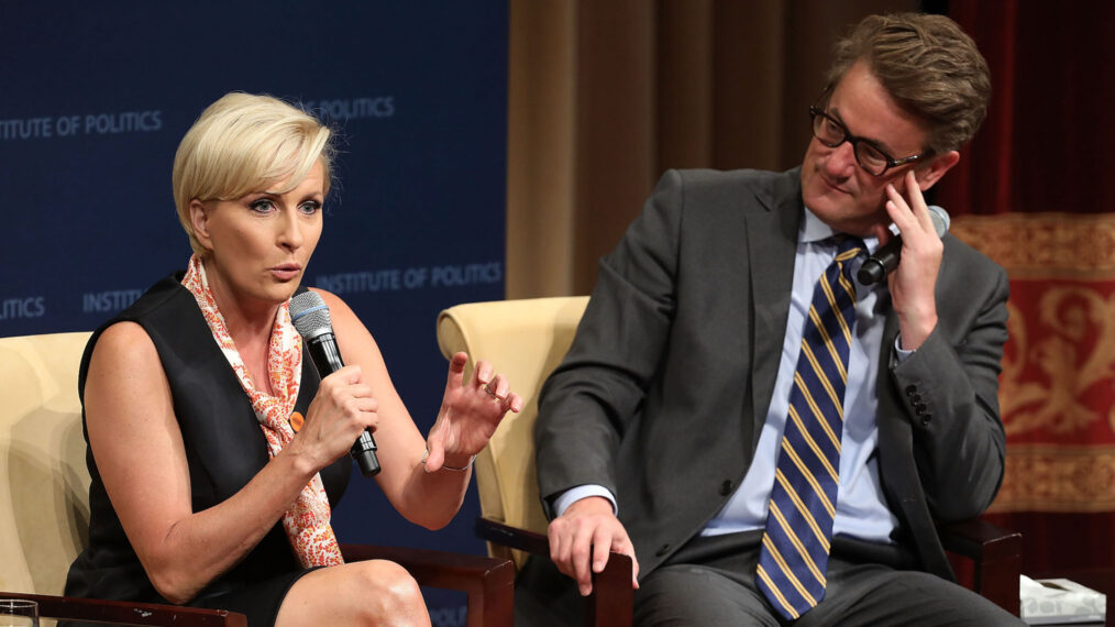 MSNBC 'Morning Joe' hosts Joe Scarborough and Mika Brzezinski are interviewed by philanthropist and financier David Rubenstein during a Harvard Kennedy School Institute of Politics event in the McGowan Theater at the National Archives July 12, 2017 in Washington, DC. Scarborough and Brzezinski, who are engaged to be married, were recently attacked by President Donald Trump on Twitter, where he called the hosts 'Psycho Joe' and 'low I.Q. Crazy Mika,' among other personal insults.