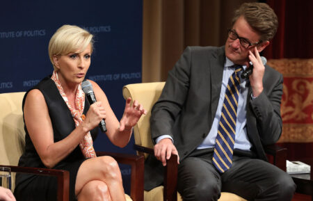 MSNBC 'Morning Joe' hosts Joe Scarborough and Mika Brzezinski are interviewed by philanthropist and financier David Rubenstein during a Harvard Kennedy School Institute of Politics event in the McGowan Theater at the National Archives July 12, 2017 in Washington, DC. Scarborough and Brzezinski, who are engaged to be married, were recently attacked by President Donald Trump on Twitter, where he called the hosts 'Psycho Joe' and 'low I.Q. Crazy Mika,' among other personal insults.